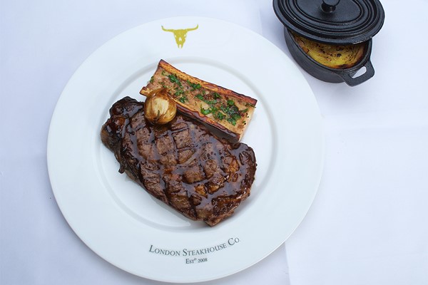 Three Courses with Sides and Cocktails at Marco Pierre White London Steakhouse Co Three Courses with Sides and Cocktails at Marco Pierre White London Steakhouse Co