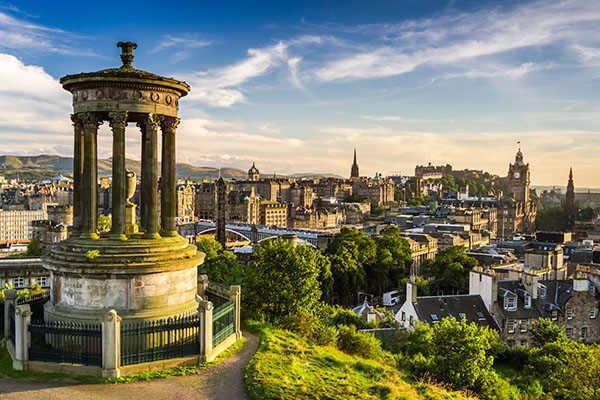 Scenic views of the buildings and trees across the city of Edinburgh