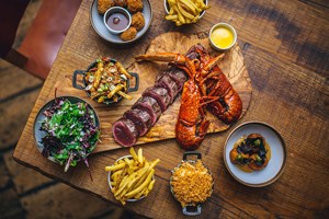 Two Course Meal with Drinks for Two at a Mac and Wild in London