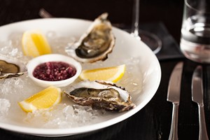 A Dozen Oysters and a Glass of Champagne Each for Two aboard RS Hispaniola