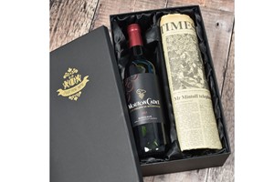 Vintage Bordeaux Red Wine and Newspaper in a Luxury Gift Box