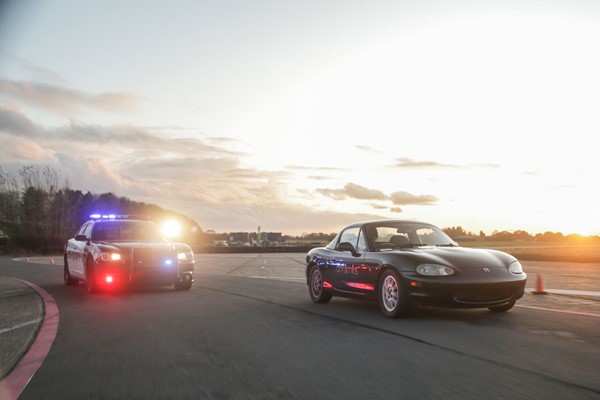 Immersive Police Pursuit Driving Experience in a Mazda MX5