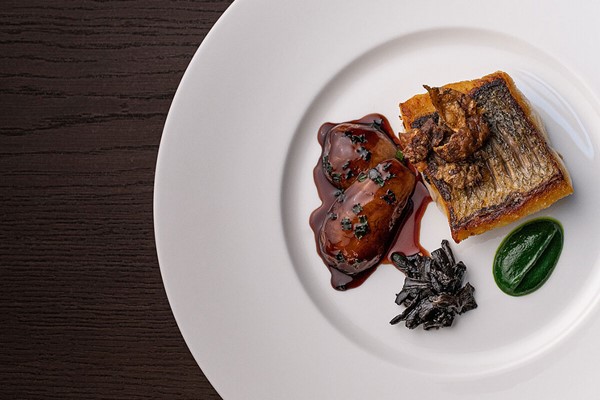 Four Course Tasting Menu with a Glass of Wine for Two at St James Hotel and Club