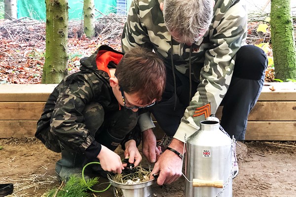 Parent and child taking part in an activity at Yorkshire activity centre