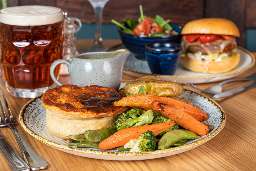 Three Course Meal with a Drink for Two at a British Pub or Bar