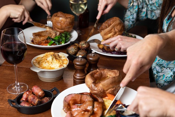 Sunday Roast with a Glass of Wine for Two at a British Pub or Bar