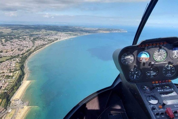 12 Mile Private Flight for up to Three People in a R44 Helicopter