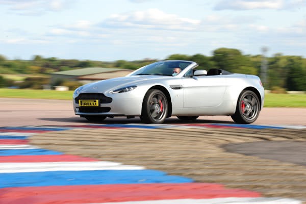 Click to view product details and reviews for Aston Martin Vs Porsche Driving Experience At Thruxton.