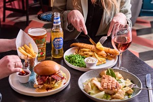 Two Course Meal with Beer for Two at a British Pub or Bar Image 1