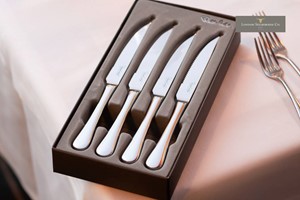 Three Course Dinner and Wine Flight for Two at London Steakhouse Co. plus Apron and Steak Knives picture