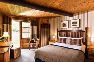 Overnight Woodland Cabin Stay with Dinner for Two at Chevin Country Park Hotel & Spa picture