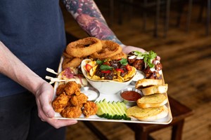 Sharing Platter and Six Bottle Bucket for Two at a Sports Bar & Grill picture