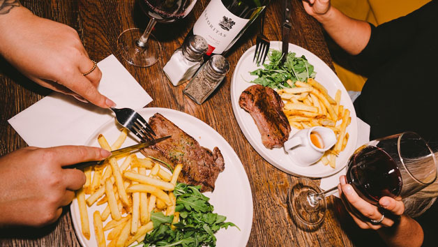 Revolution Bar Steak and Bottle of Wine for Two picture