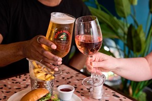 Steak with a Bottle of Wine for Two at a British Pub or Bar Image 2