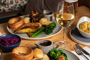 Sunday Roast for Two with a Glass of Wine at a British Pub or Bar Image 2