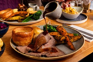 Sunday Roast for Two with a Glass of Wine at a British Pub or Bar Image 1