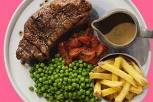 Steak with a Bottle of Wine for Two at a British Pub or Bar Image 3