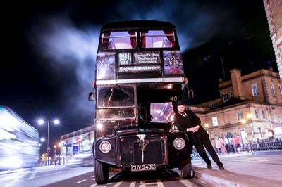 Double decker bus starting on the York ghost bus tour in York