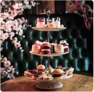 Floral afternoon tea with tiered cake stand