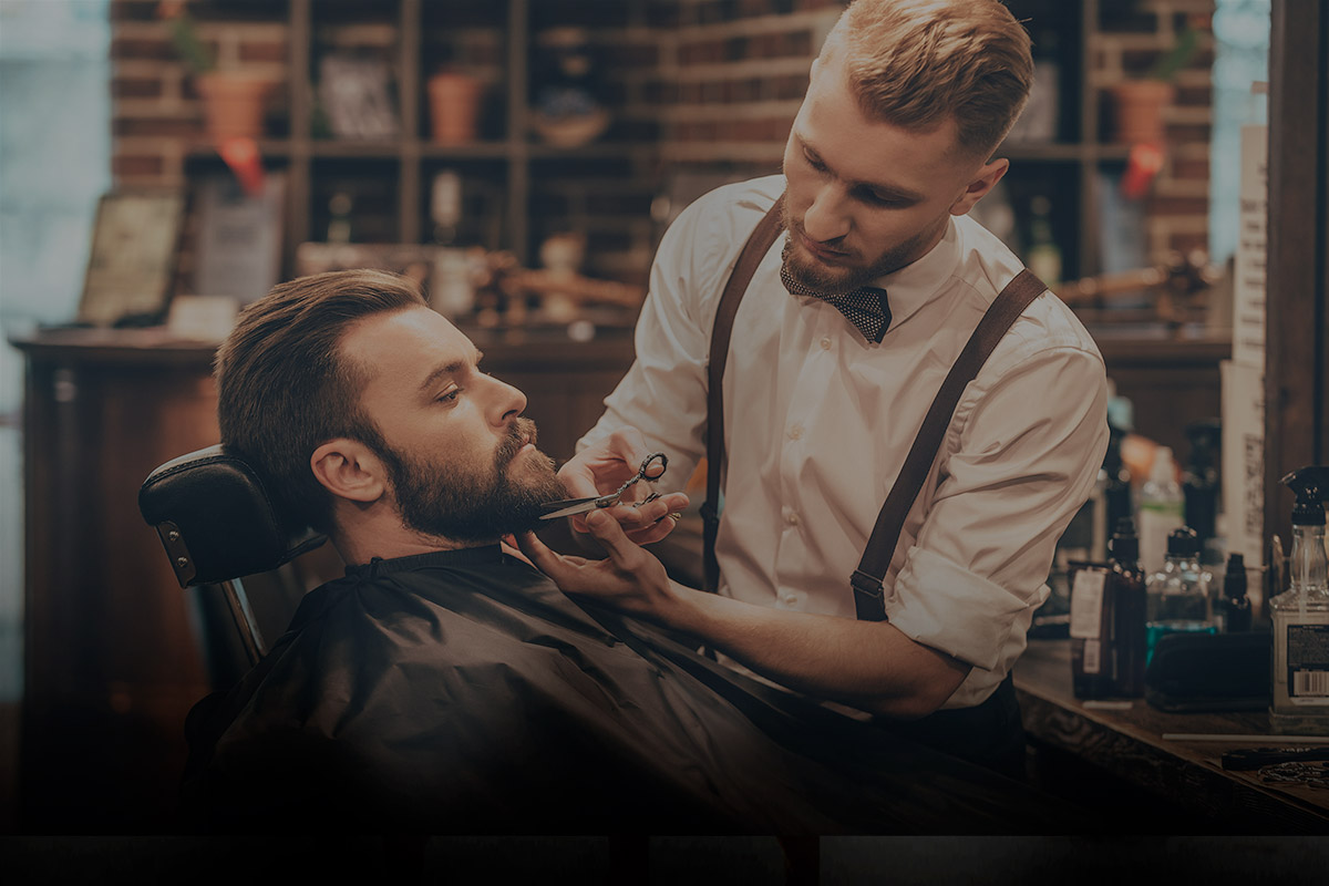 Man having a shave and haircut