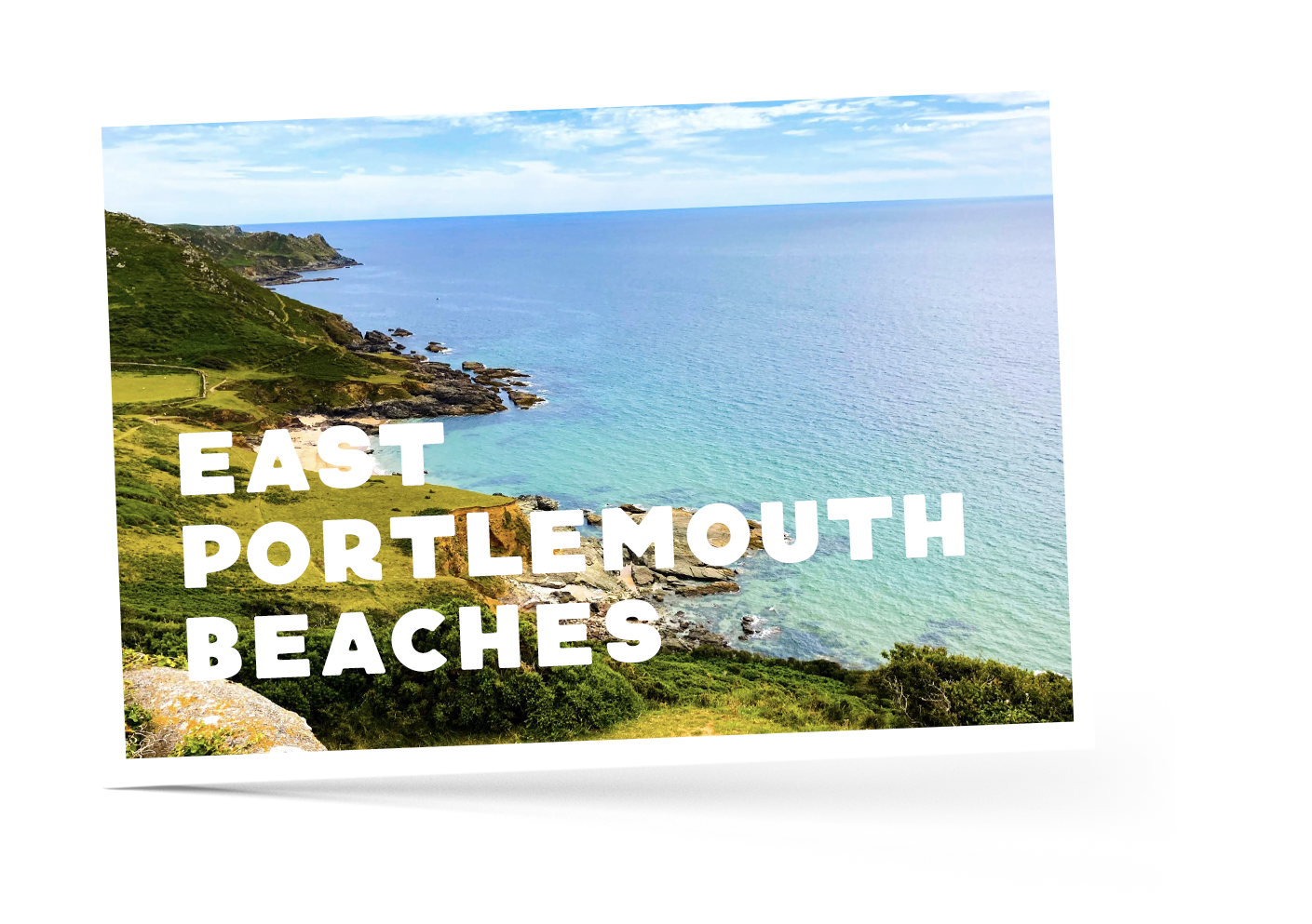Grassy topped cliffs overlooking East Portle Mouth Beach and bright blue sea