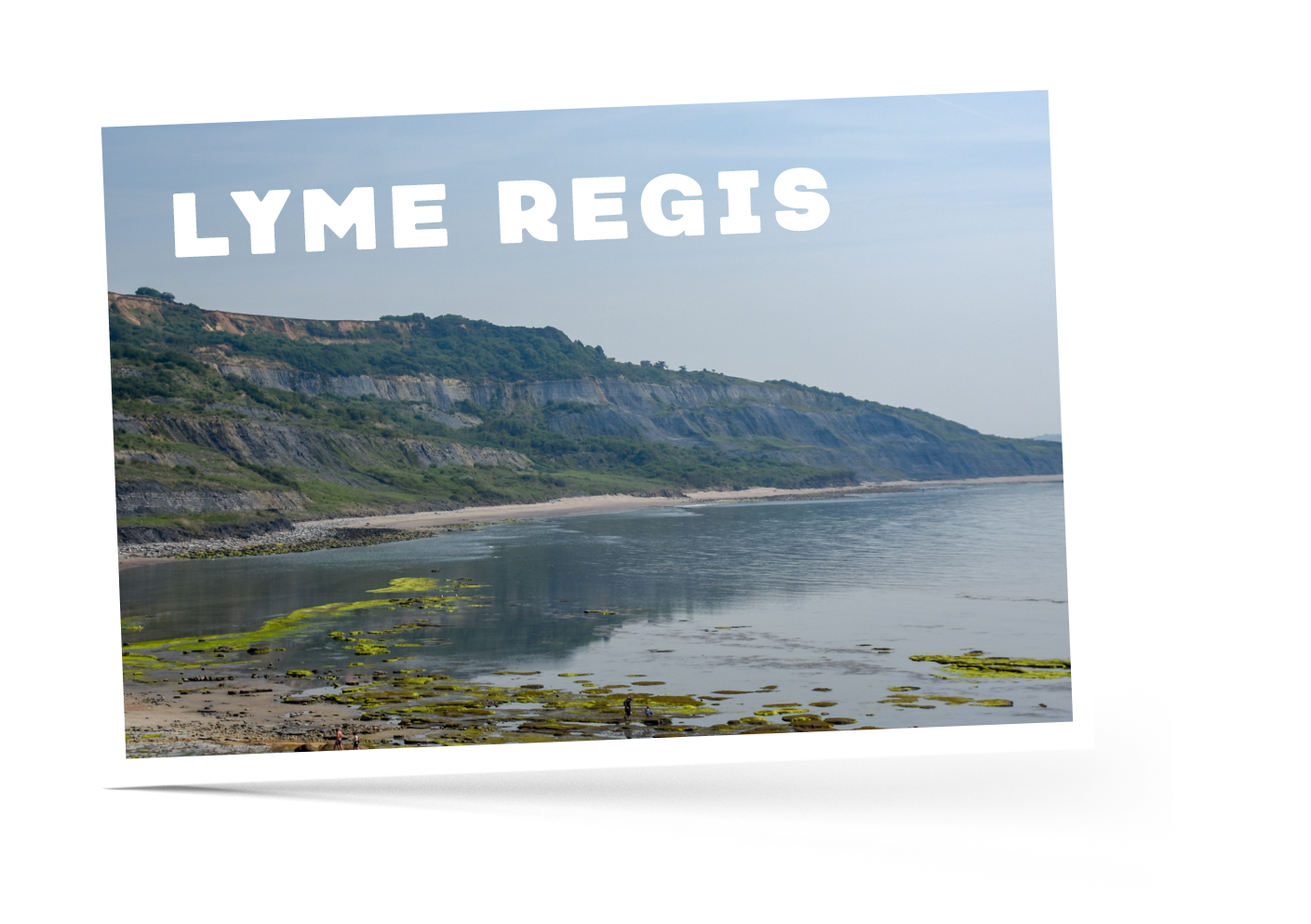 Rugged cliffs, thin strip of beach and shores in Lyme Regis, Devon